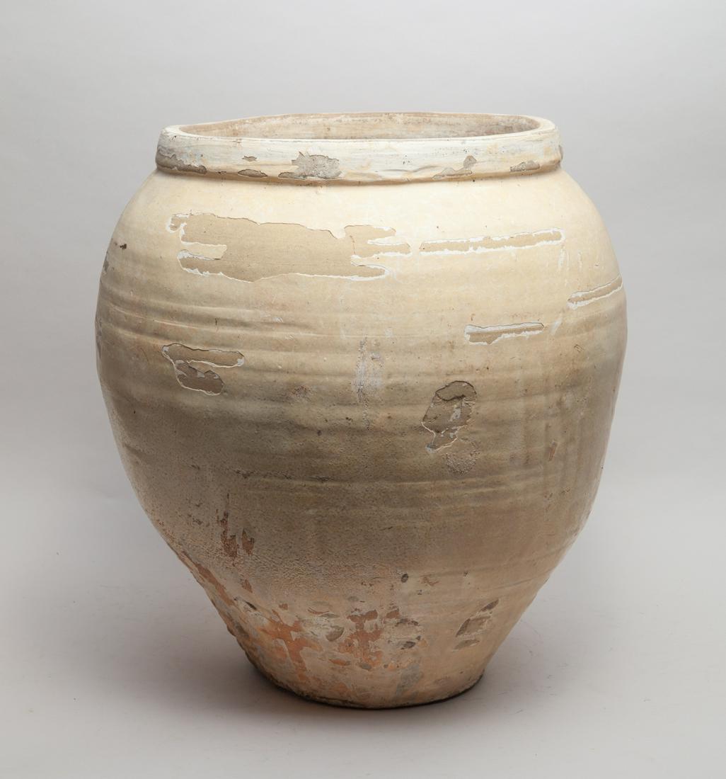 Massive Korean Early Joseon Pottery Jar: Massive Korean pottery jar of ovoid form with short neck. 18.5inch H, 17.5inch W.