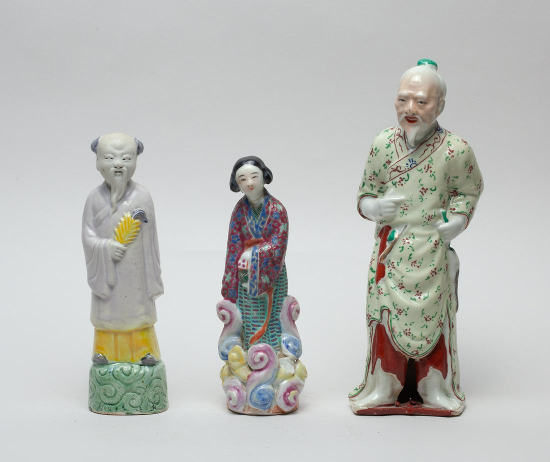Chinese Export Porcelain Figures: Three porcelain figures: an old man with a four-character mark on the bottom; a woman standing on clouds with a three-character mark on the bottom; a man holding a fan. 9.2inch H, 3.4inch L, 2.6inch W