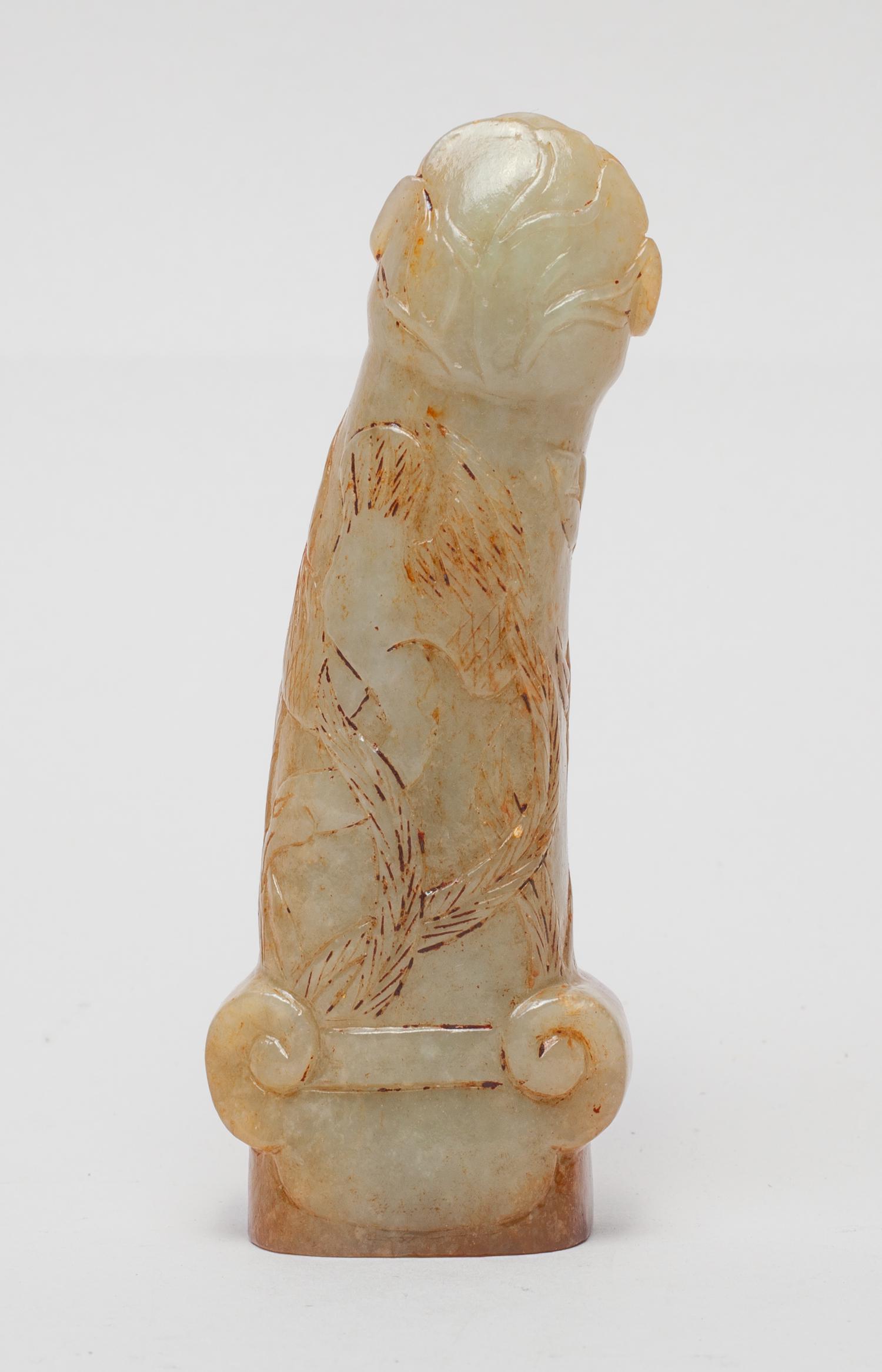 Indian Old Russet Jade Sword Handle: Collectible russet jade sword handle carved with in low relief with lotus, the top end pierced and carved with lotus leaf to both sides. 4inch L, 1.5inch W.