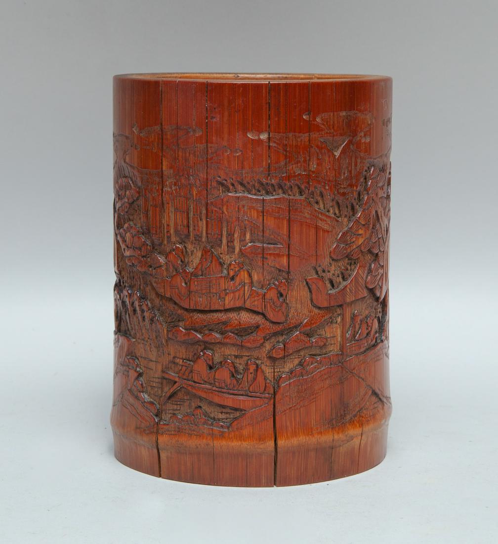 Antique Chinese Carved Bamboo Brush Pot: Chinese 19th century style bamboo brush pot carved around the exterior with a continuous landscape scene. 6inch H, 4.2inch W.