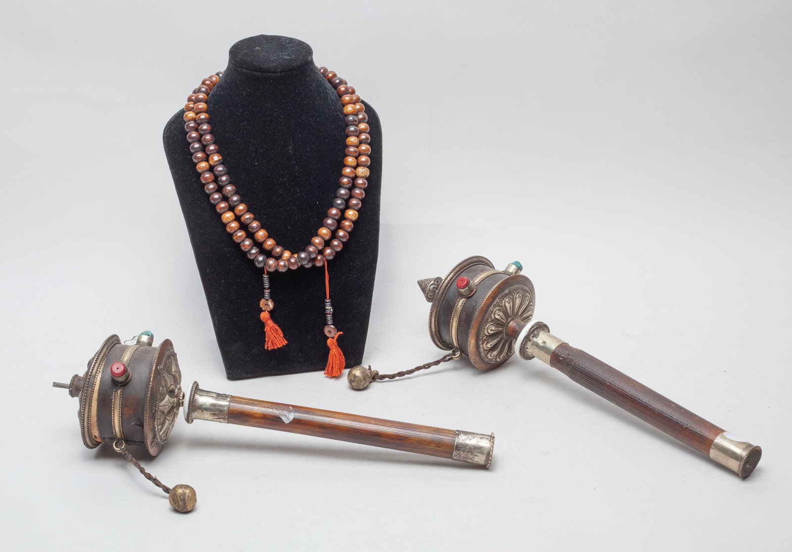 Tibetan Bone Beads & Prayer Wheel: Including Tibetan bone carved beads and two prayer wheel inlaid with gemstone. 15inch L, 4.2inch W (largest).