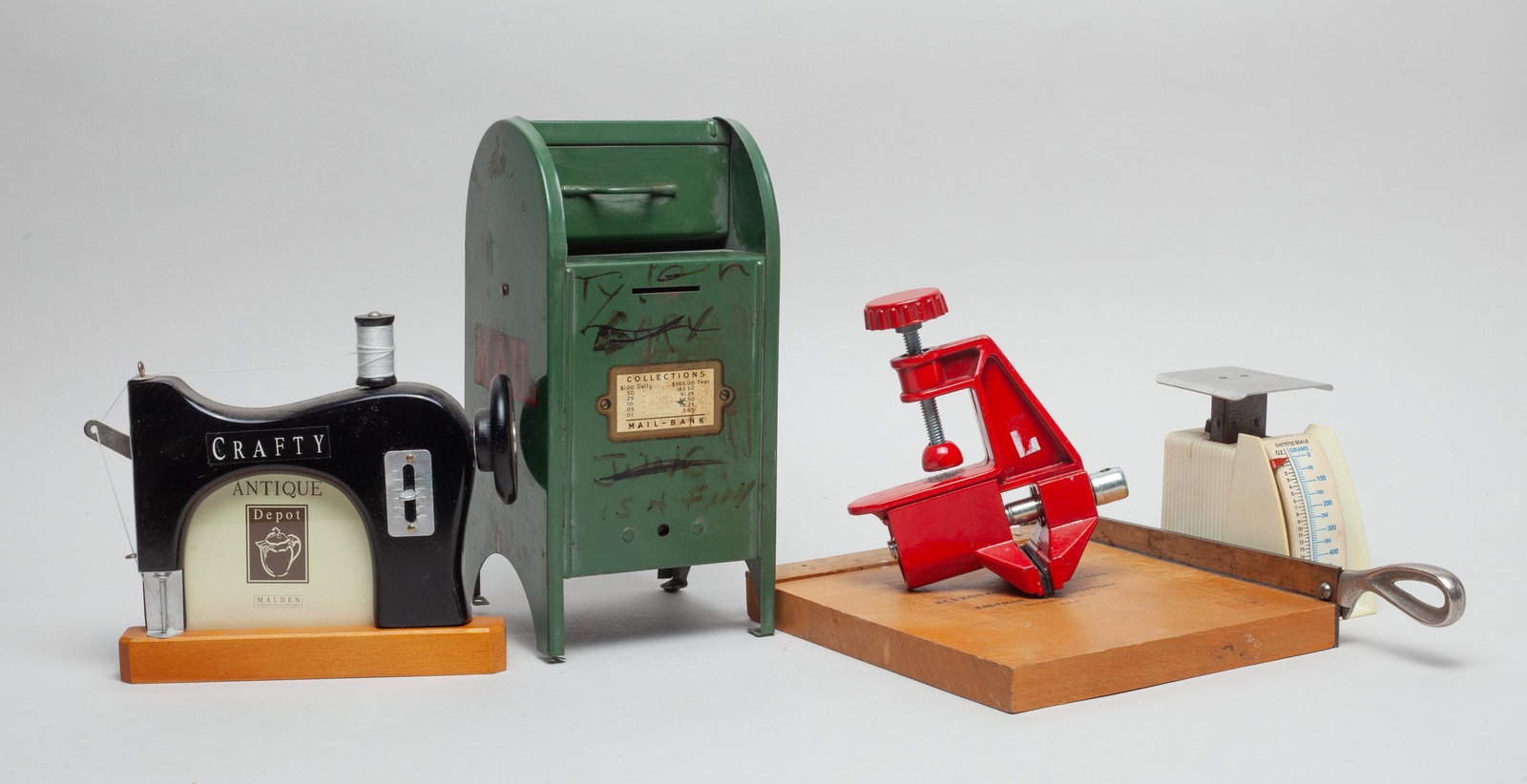 Vintage Coin Bank & Mini Machines: Including a coin bank, a photo frame, a paper cutter, and a clip. 4.5inch L, 4.25inch W, 9.25inch H (largest).