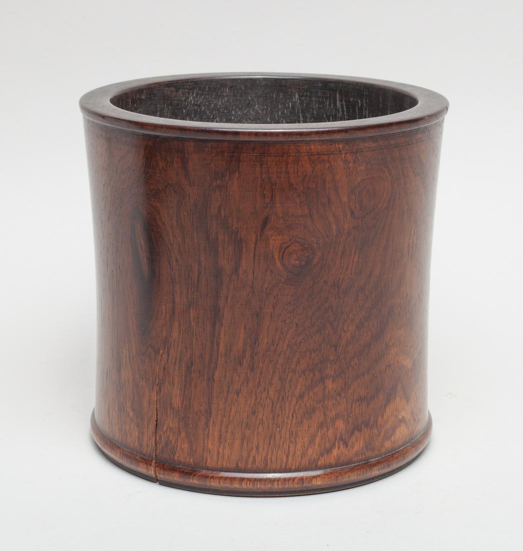 Collectible Chinese Wood Brush Pot: Of gently waisted cylindrical form, the base pierced with a large aperture and blocked with a wood plug. 6inch H, 6.3inch W.