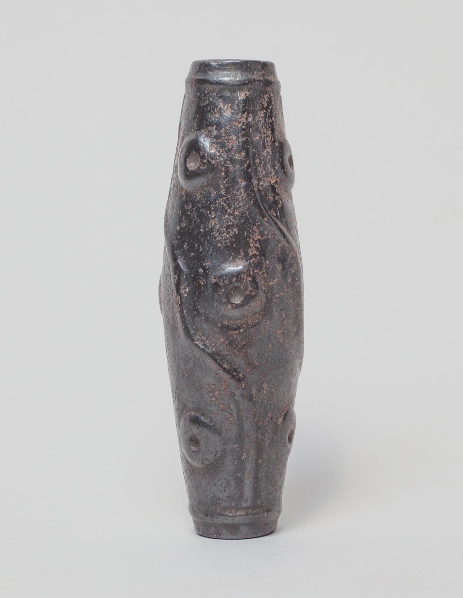 Chinese/Tibetan Meteorite Large Bead: Collectible black meteorite long bead, carved on the exterior with rings and curves. 2.9inch L, 0.9inch W.