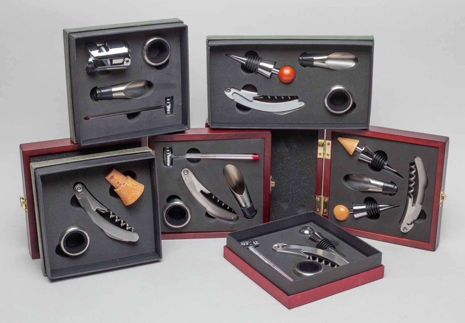 Executive Wine Collectors Set: Collection of six wine opener and accessory sets, with boxes. 6.5inch L, 6.1inch W, 2inch H (box size).