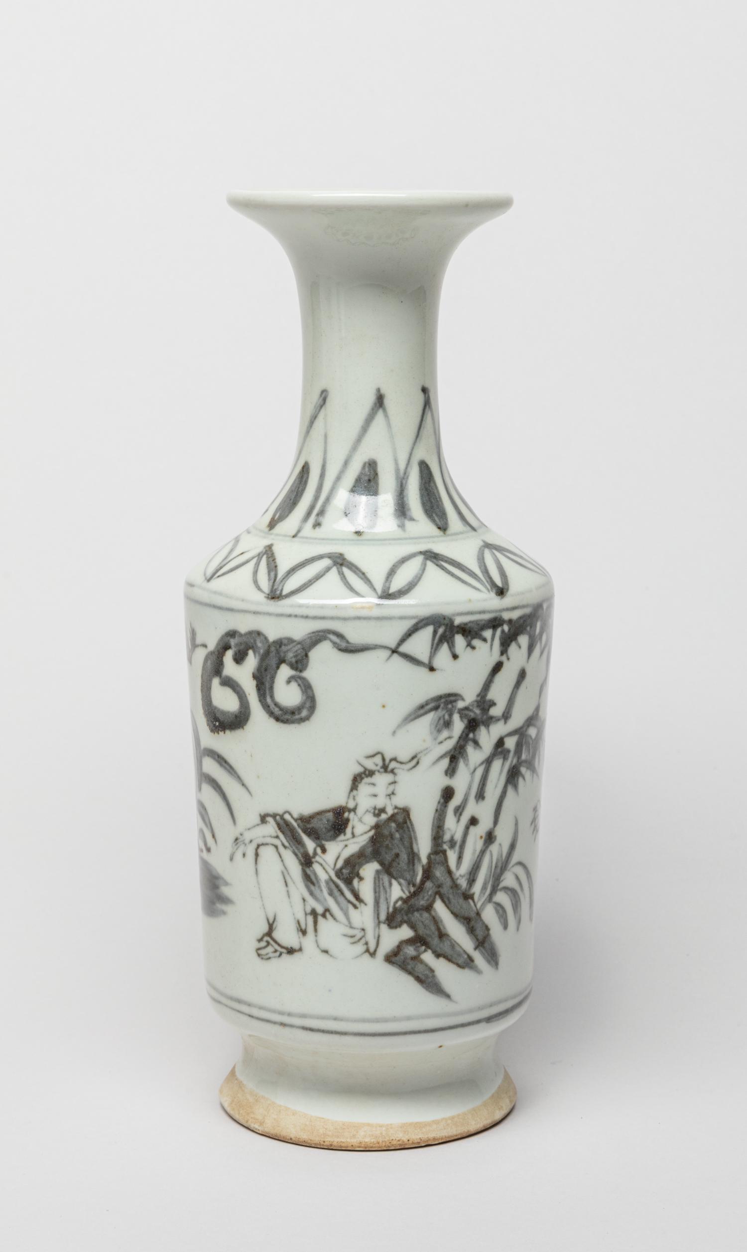 Korean Blue & White Porcelain Vase: The gently tapered cylindrical body rising from a spreading foot to a columnar neck and flared rim, painted on the body with a scholar and a beast in landscape with pine tree and bamboo, all beneath b