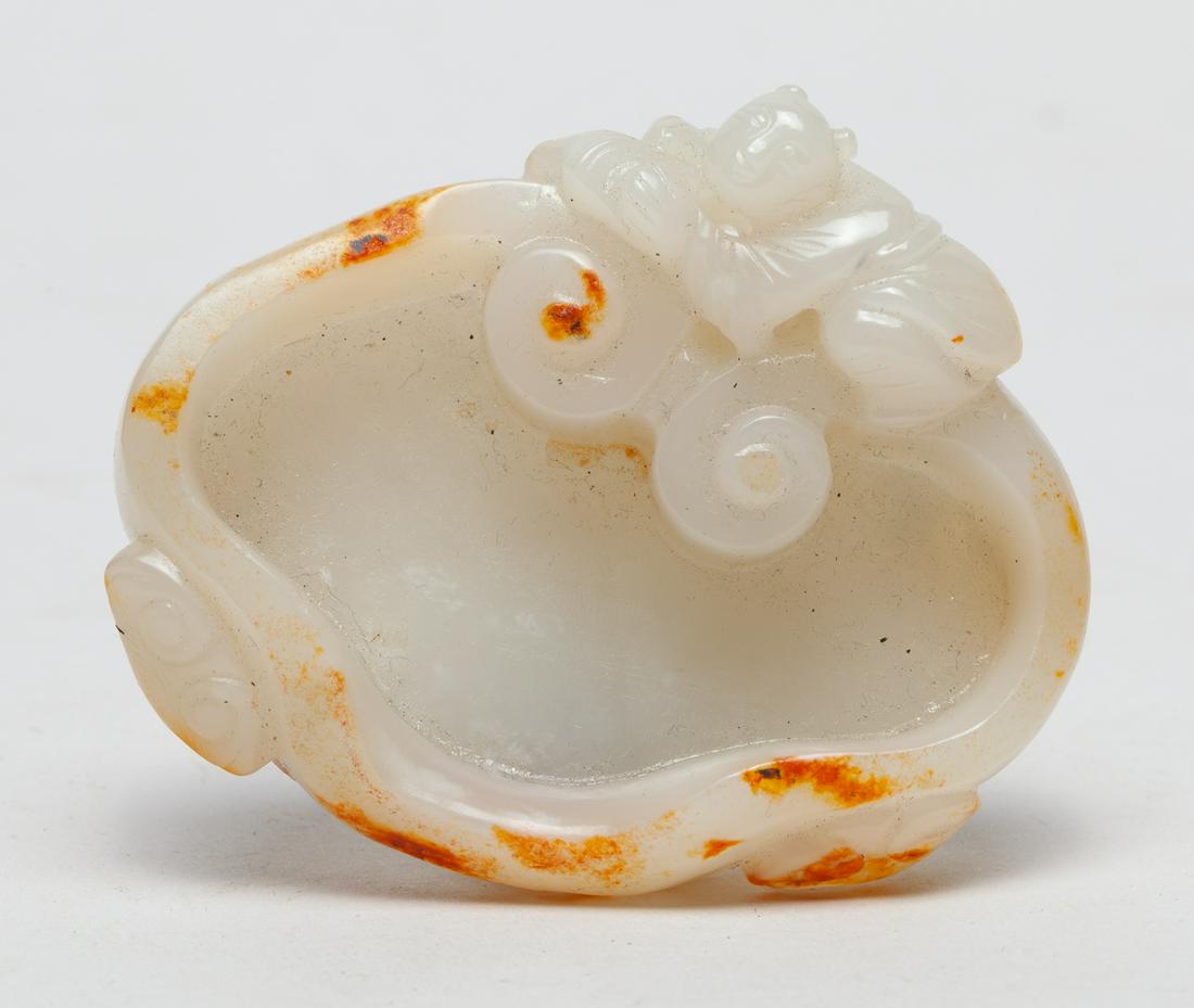 Chinese Russet Jade Carved Washer: The lingzhi-shaped vessel with generous thick walls, borne on a thick leafy stem issuing clusters of smaller lingzhi heads around the bottom, flanked by a crouching boy holding on to the walls claspin