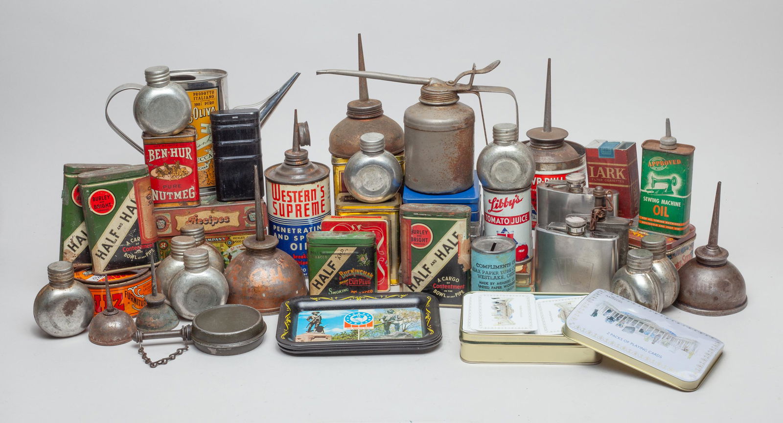 Vintage metal Jar, Box & Oil Cans: A large group of metal jars, boxes and oil dispenser oiler cans. Size varies.