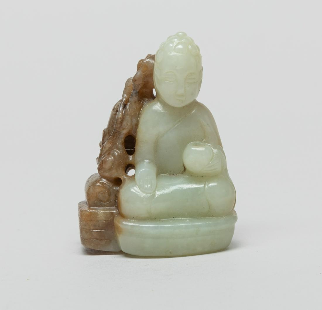 Chinese Jade Carved Buddha: The seated Buddha with left hand holding an elm bowl and right hand in abhaya mudra, a dragon sinuous amidst clouds around his back. 2.5inch H, 1.8inch L, 1.1inch W.