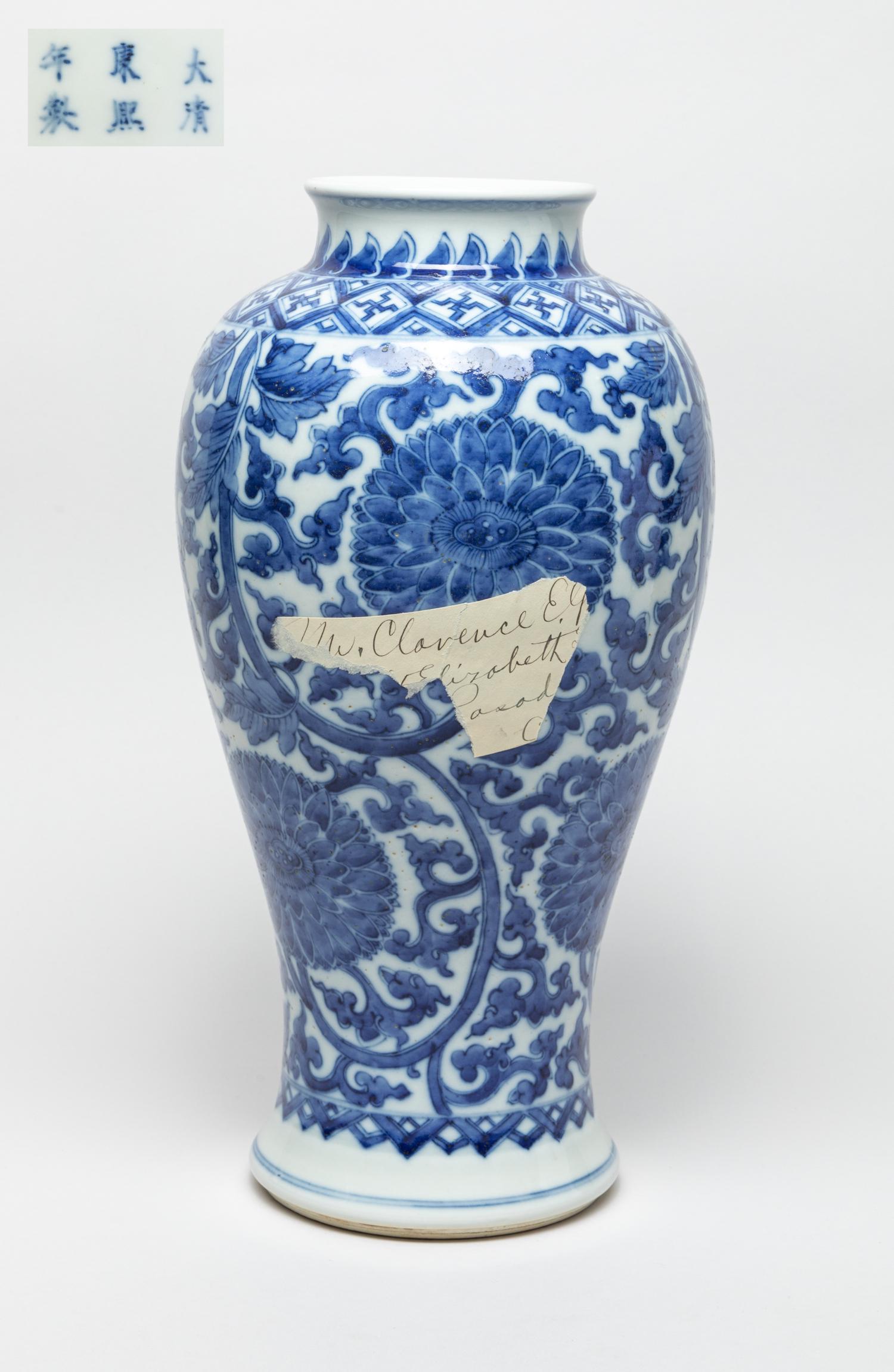 Collectible Chinese Porcelain Vase: Of baluster form, painted with interlocking leafy lotus scrolls around the exterior, the bottom marked with six characters. 12.6inch H, 6.5inch W.