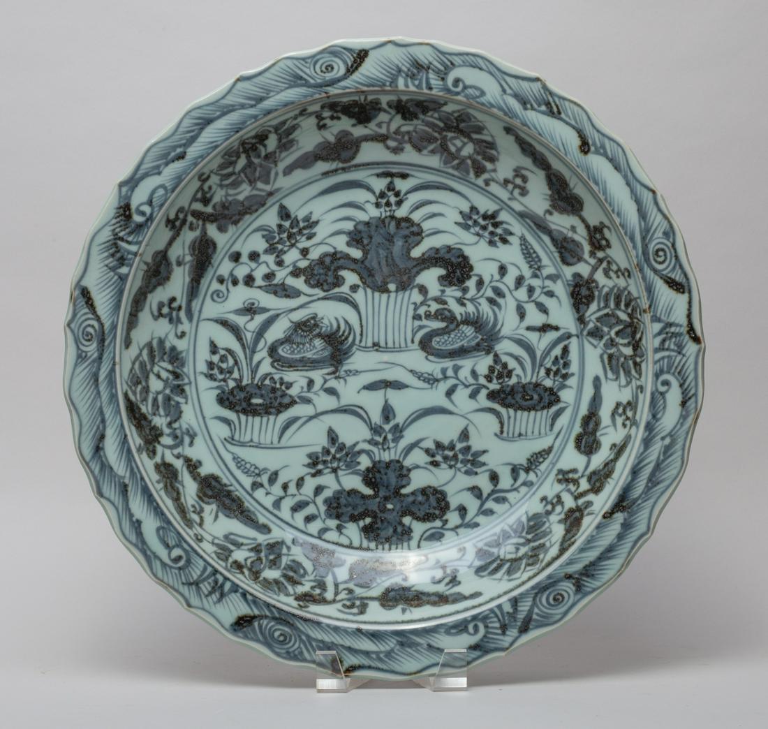 Chinese Export Blue & White Porcelain Charger: The interior centre painted with mandarin ducks amidst lotus, the sides decorated with flower sprays to the inside and out. 15.2inch W.