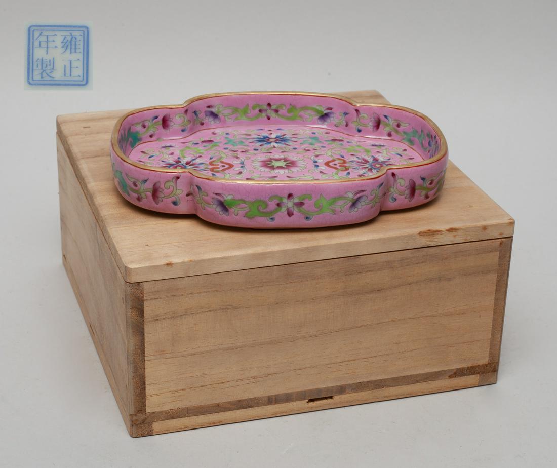 Chinese Enameled Porcelain Brusher Washer: Of ruyi head shape, enameled with lotus foliage on pink ground, the bottom with a seal mark, with box. 6inch L, 4.3inch W. The Estate of Little Tokyo Store Closed Sale, Los Angeles.