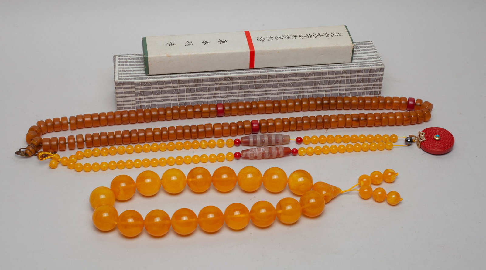 Estate Chinese/ Japanese Prayer Beads: Chinese/Japanese prayer beads, decorated with agate beads and cinnabar like toggle. 1.1inch W (largest bead size).