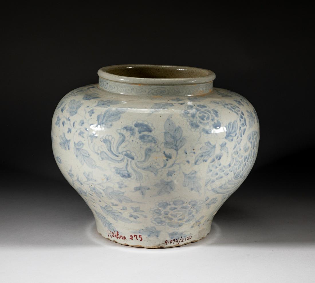 Large Hoian Porcelain Jar: The tapered ovoid body painted around the exterior with birds standing amidst blooming lotus sprays. Approx. 8.5-10.2 inch.