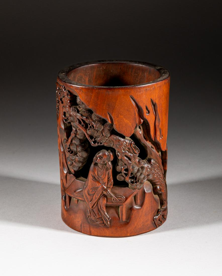 Rare Chinese Boxwood Brushn Pot: Of cylindrical form, carved in openwork with a scholar holding a brush pen beneath a pine tree, inscribed with related poems. Approx. 5.2-3.7 inch.