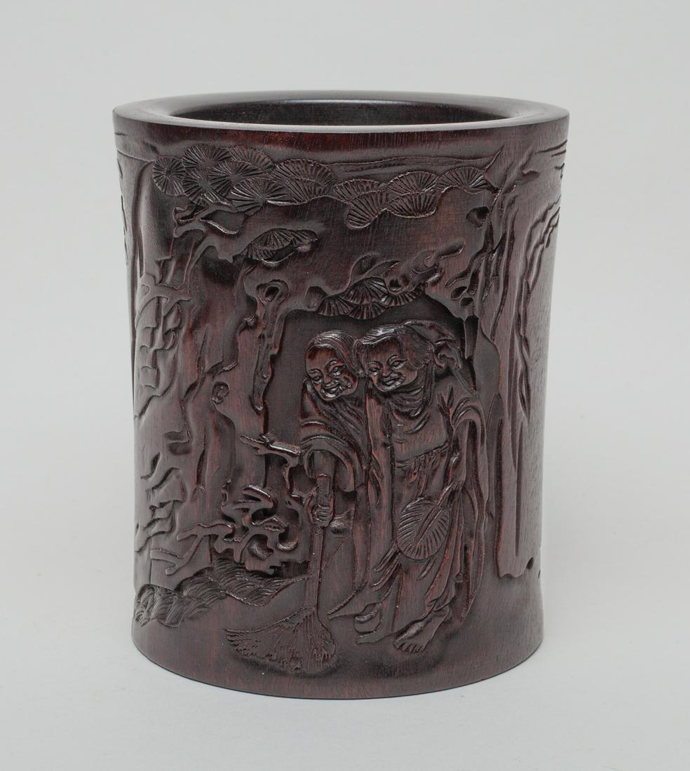 Rare Chinese Carved Wood Brush Pot: Of gently waisted form, the exterior carved figures in landscape with inscription, the bottom pierced with an aperture with stopper. Approx. 5.5-4.6 inch.
