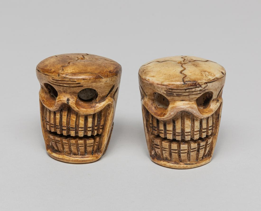 Massive Tibetan Carved Beads: Two special Tibetan bone carved skulls. Approx. 2.05-1.8 inch (largest).