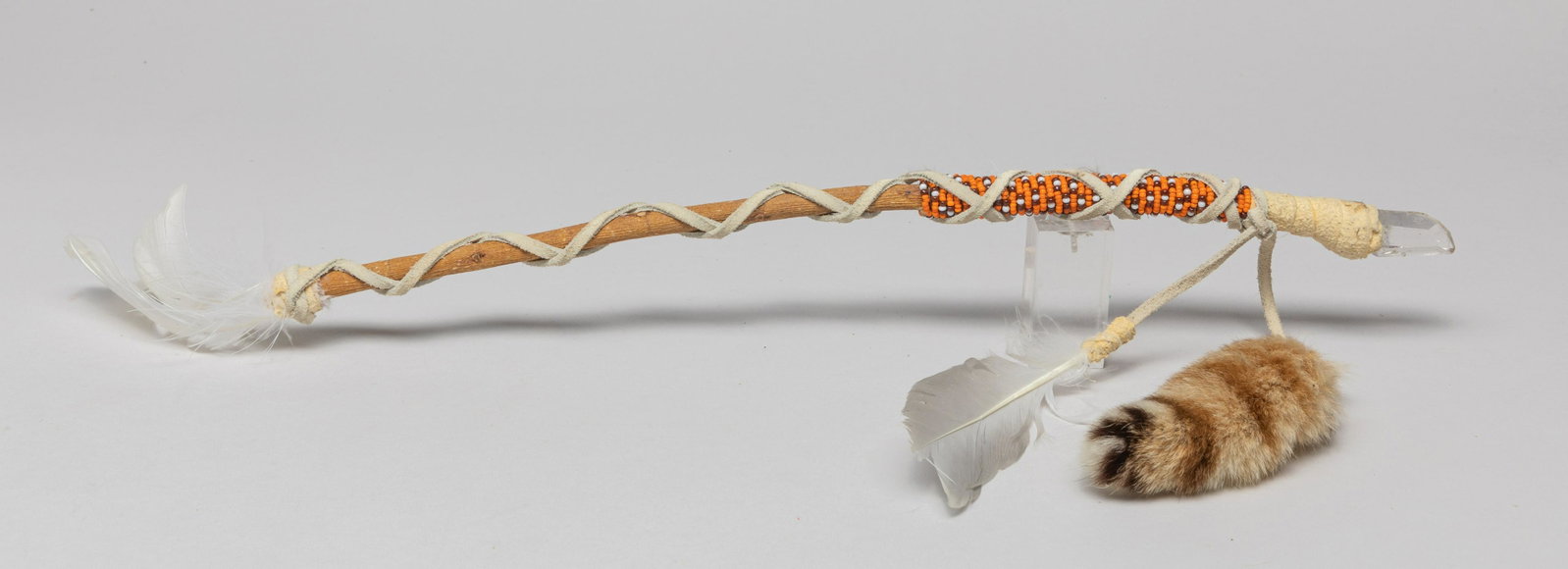 Zuni Medicine Man Spear w/ Crystal: Special Zuni fetish medicine man spear, decorated with crystal, beads and feather. Approx. 15.5inch L.