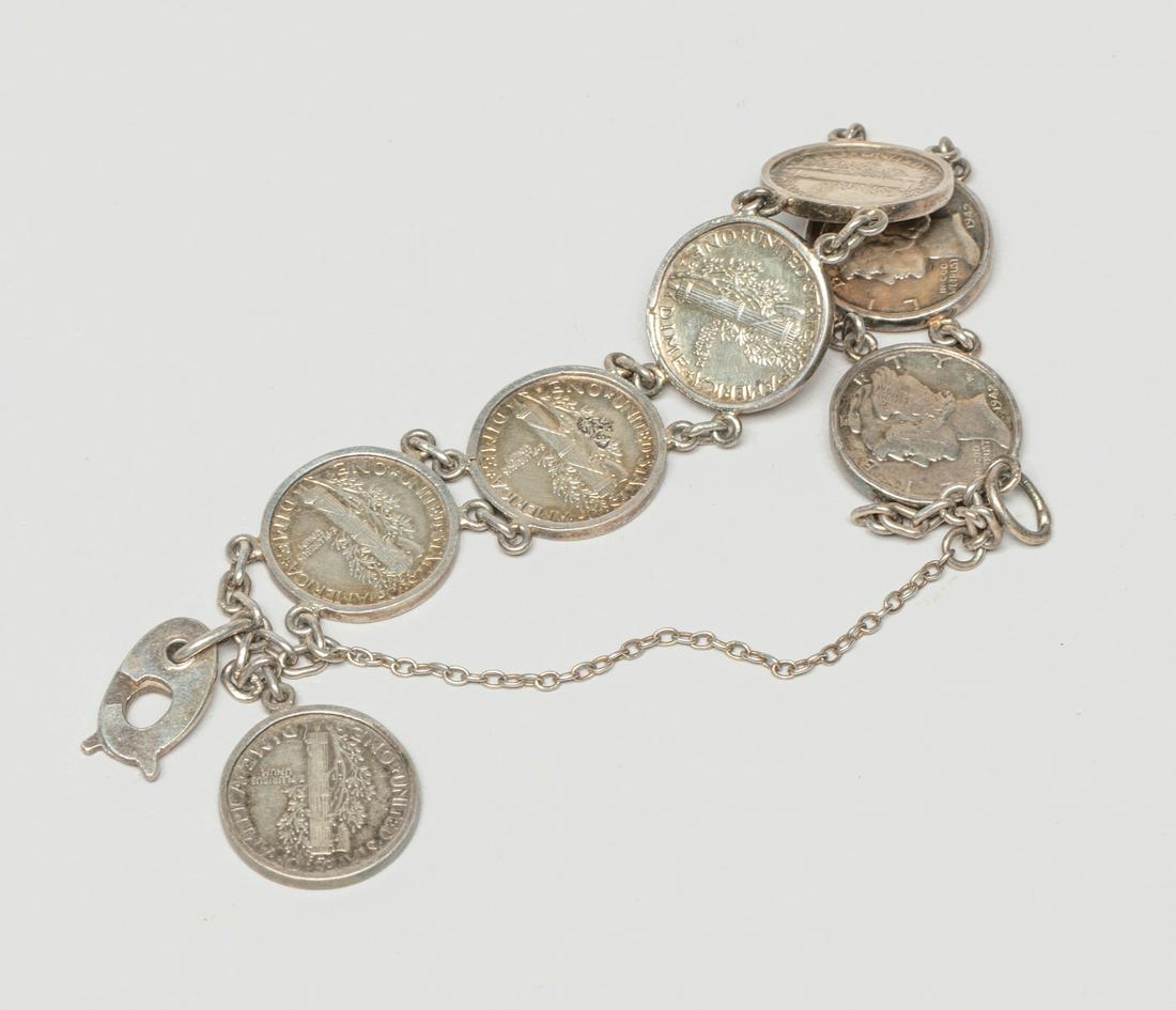 Silver Coin Bracelet: Special silver coin bracelet, comprised of 7 U.S.A. dimes. Approx. 28 grams (total weight).