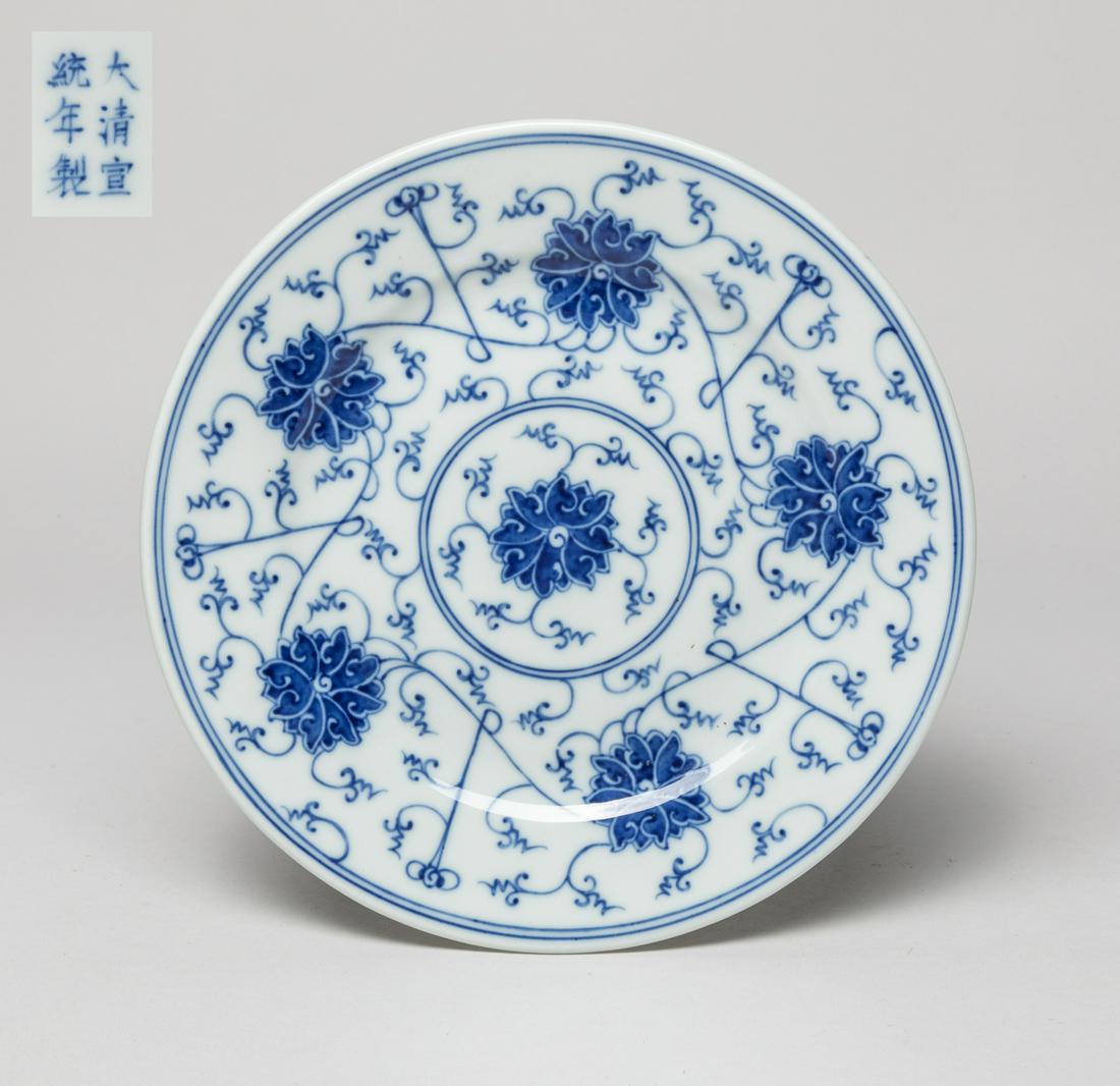 Chinese Export Porcelain Plate: The interior painted with twining lotus sprays, the bottom marked with six characters. Approx. 8.2 inch W.