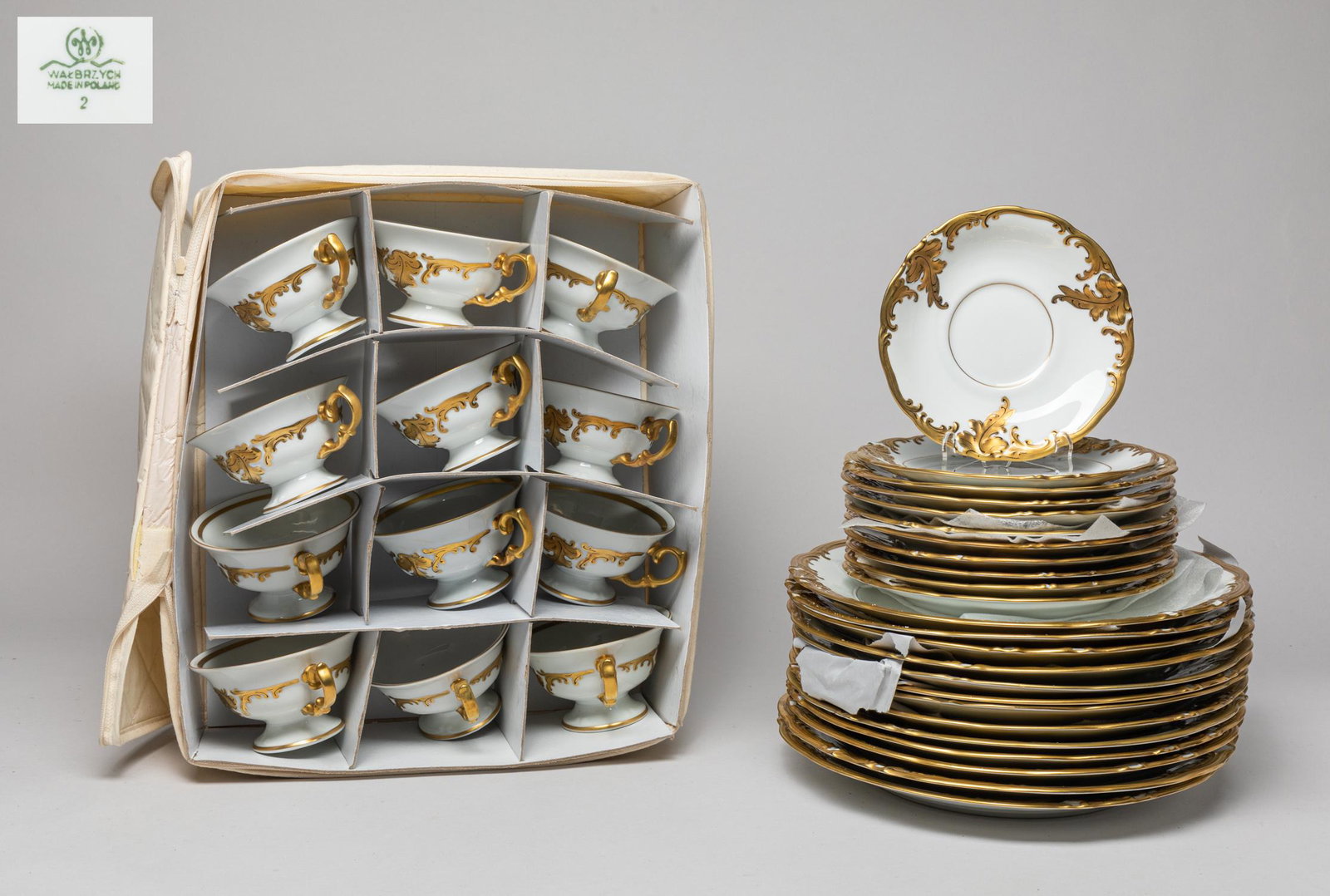 Vintage Poland Walbrzych Porcelain Pieces: Large Set of vintage delicate Poland Walbrzych porcelain plates and cups. Approx. 10.2inch W (largest plate).