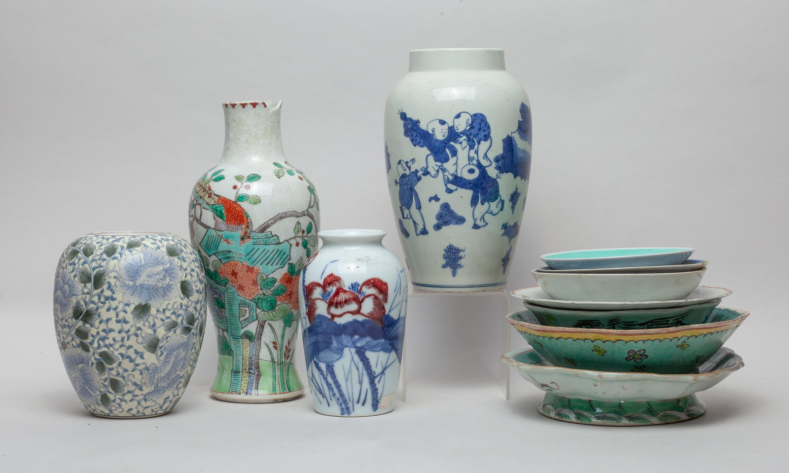 Estate Chinese Porcelain Vases & Plates: A large set of Chinese porcelain vases and plates. Size varies.