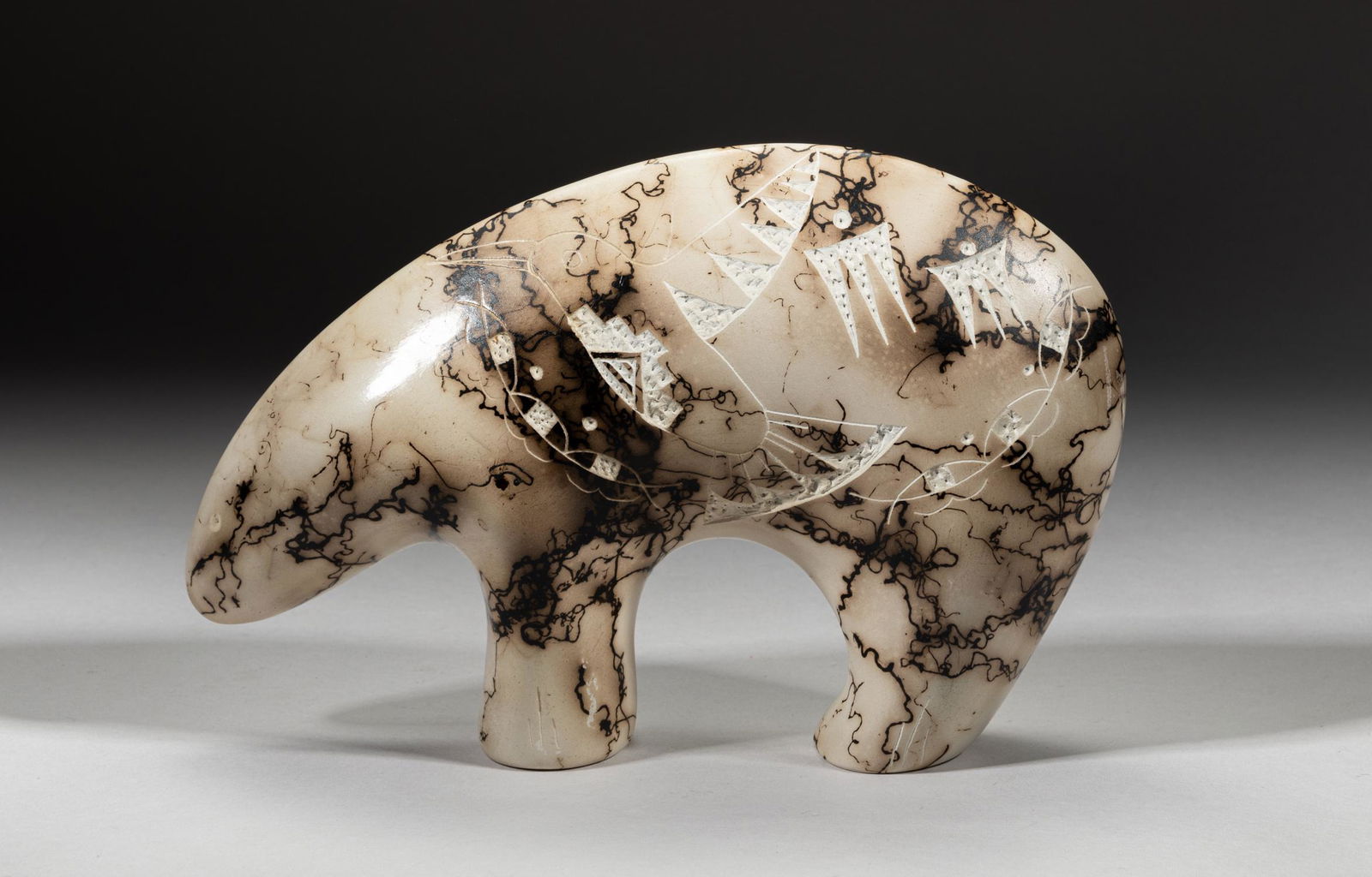 T. Vail Navajo Horsehair Clay Pottery Sculpture: T Vail Native American horsehair pottery table sculpture in bear form. Approx. 8.5-2.3-5.6 inch.