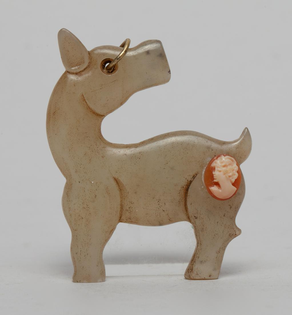 Victorian Design Chinese Jade Pendant: Chinese jade pendant carved in horse profile, its head turned backwards and pierced at the eye, the tail decorated with cameo agate. Approx. 2.1-1.7 inch.