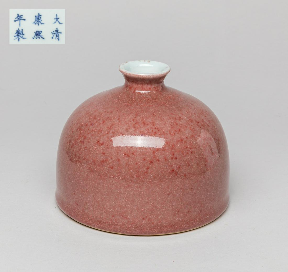 Chinese Flambe Glazed Porcelain Water Pot: Of domed form with short waisted neck, the exterior covered in mottled red flambe glaze, the bottom marked with six characters. Approx. 5.3-4.3 inch. The Estate of Little Tokyo, Los Angeles, Store Clo