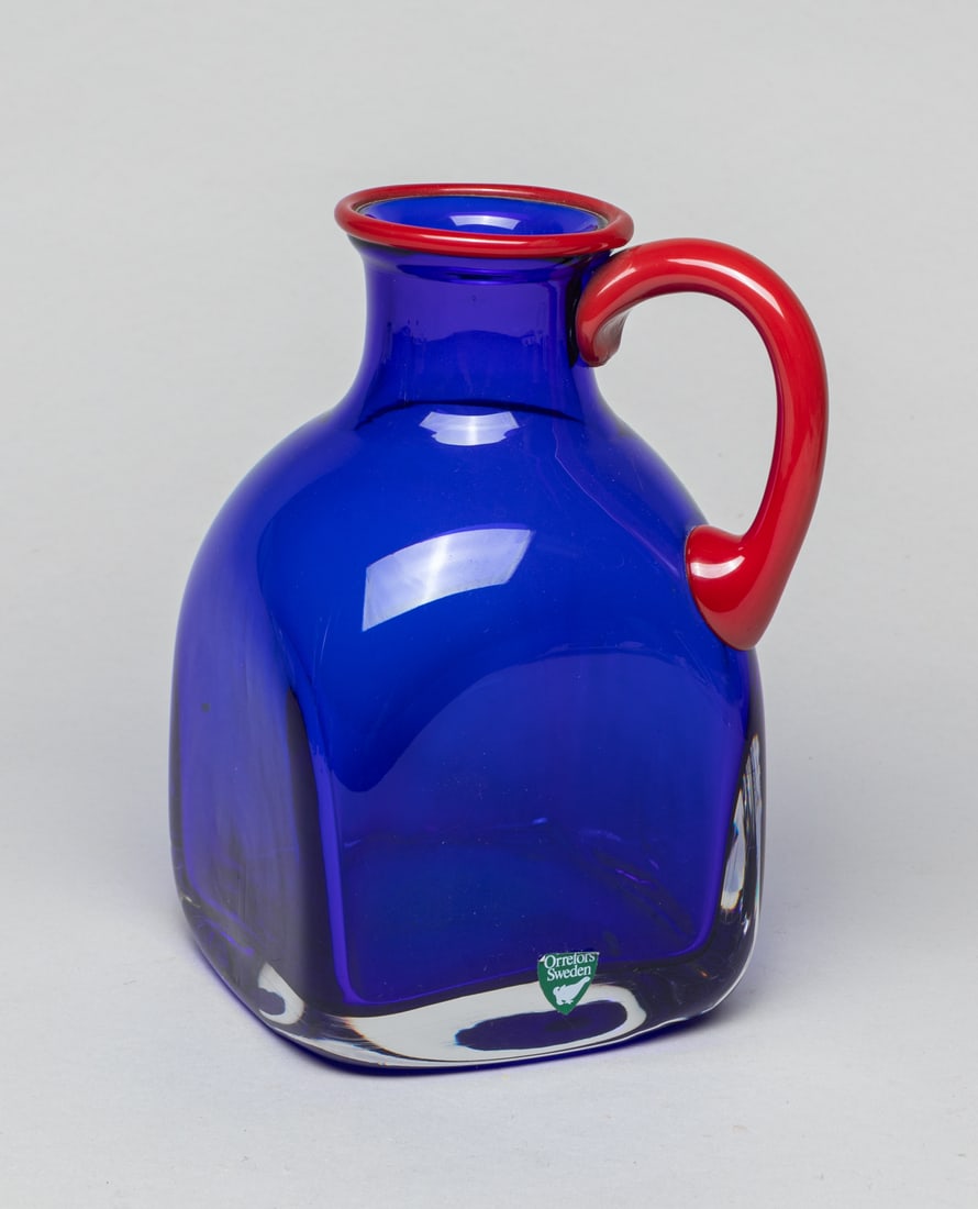 Orrefors Special Glass Bottle: Collectible Orrefors Sweden color glass bottle. Approx. 6.2-3.9-3.8 inch.