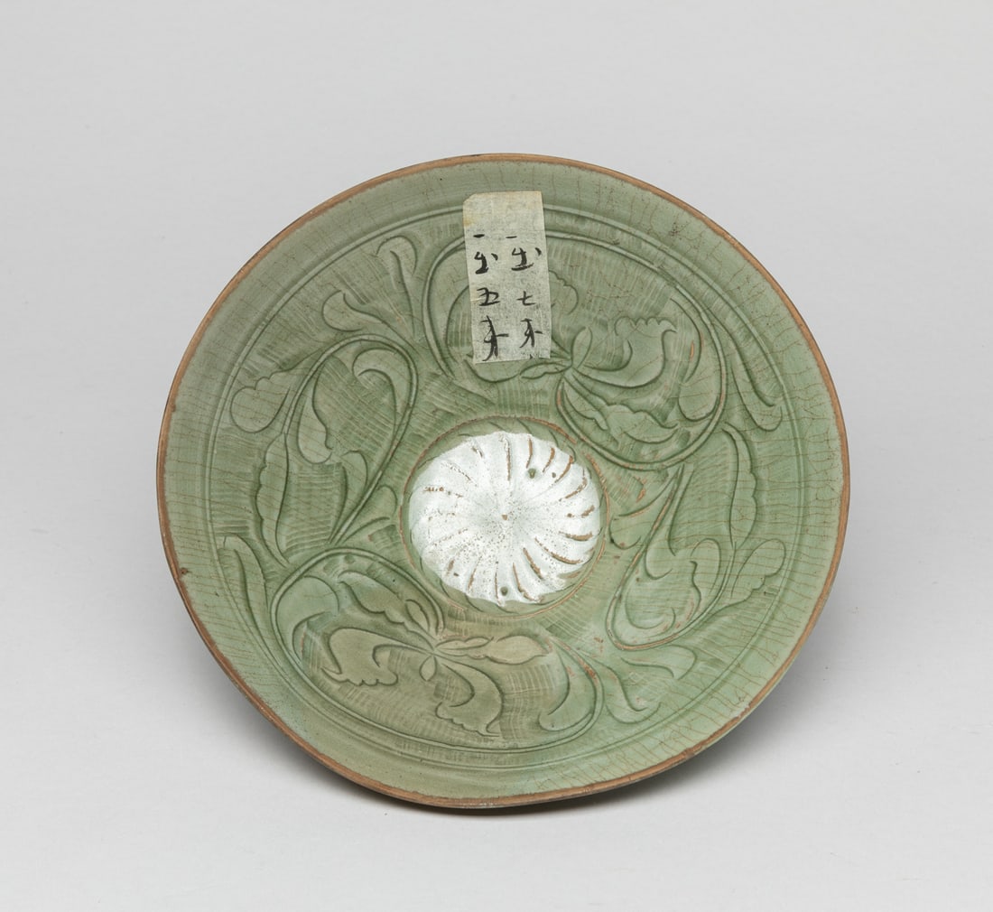 Rare Chinese Yaochou Porcelain Bowl: The bowl interior carved with lotus blossoms, covered overall in crackled celadon glaze. Approx. 7.2-2.7 inch.