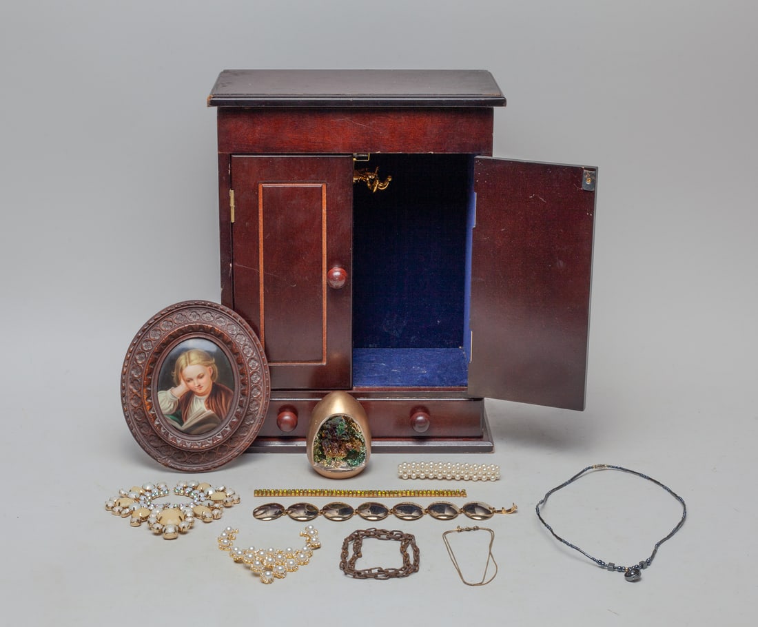 Estate Box of Costume Jewelry: Including costume jewelry pieces, a special egg sculpture and a frame decor, with jewelry box. Approx. 9.5-5.2-12.2 inch (box size).