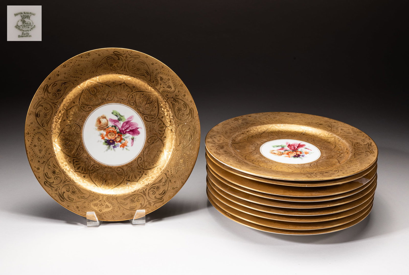 Royal Bevane Gold Flower Plates: Set of Royal Bevane porcelain plates, the centre painted with flowers, surrounded with gold-color foliage. Approx. 10.8inch W (each).
