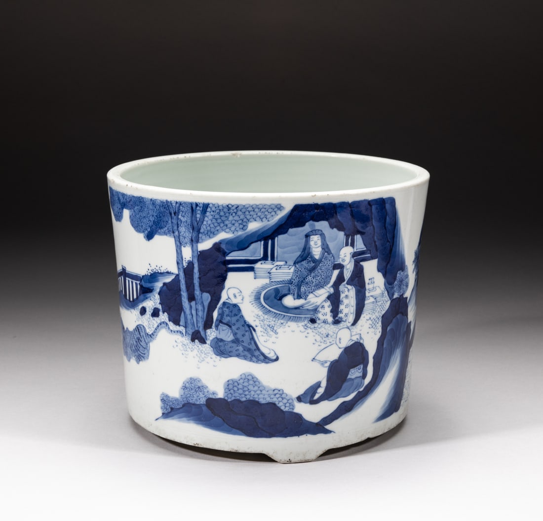 Chinese Blue & White Porcelain Brush Pot: Of cylindrical form, with three short tapered feet, the exterior painted with figures in various positions in landscape. Approx. 8.3-6.6 inch.