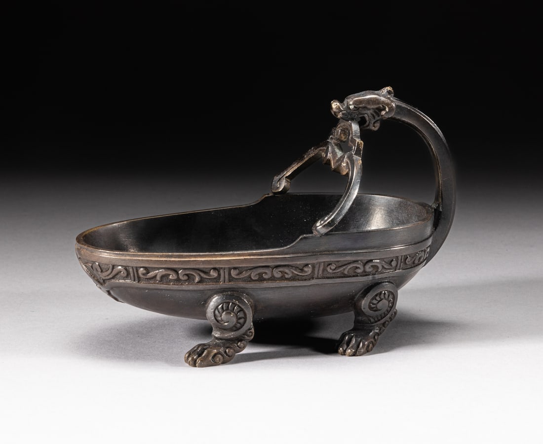 19th France Holy Water Pot: Of oval form, supported on four paw form legs, set with a beast as handle. Approx. 5.7-3.2-3.7 inch.