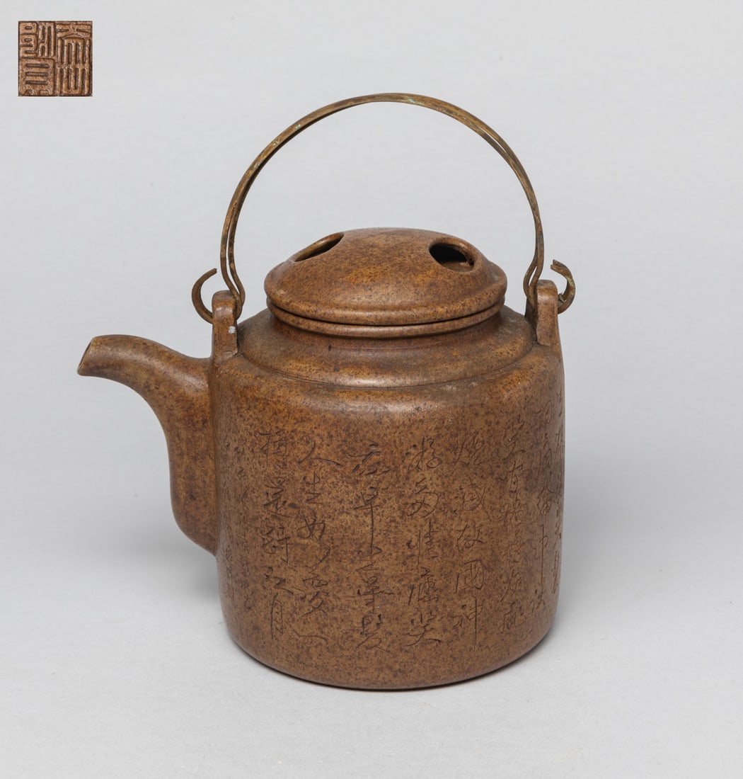 Estate Chinese Yixing Zisha Teapot: The zisha tea pot exterior incised with poems, the lid interior and the bottom carved with seal mark. Approx. 5.5-4.8-4.1 inch.