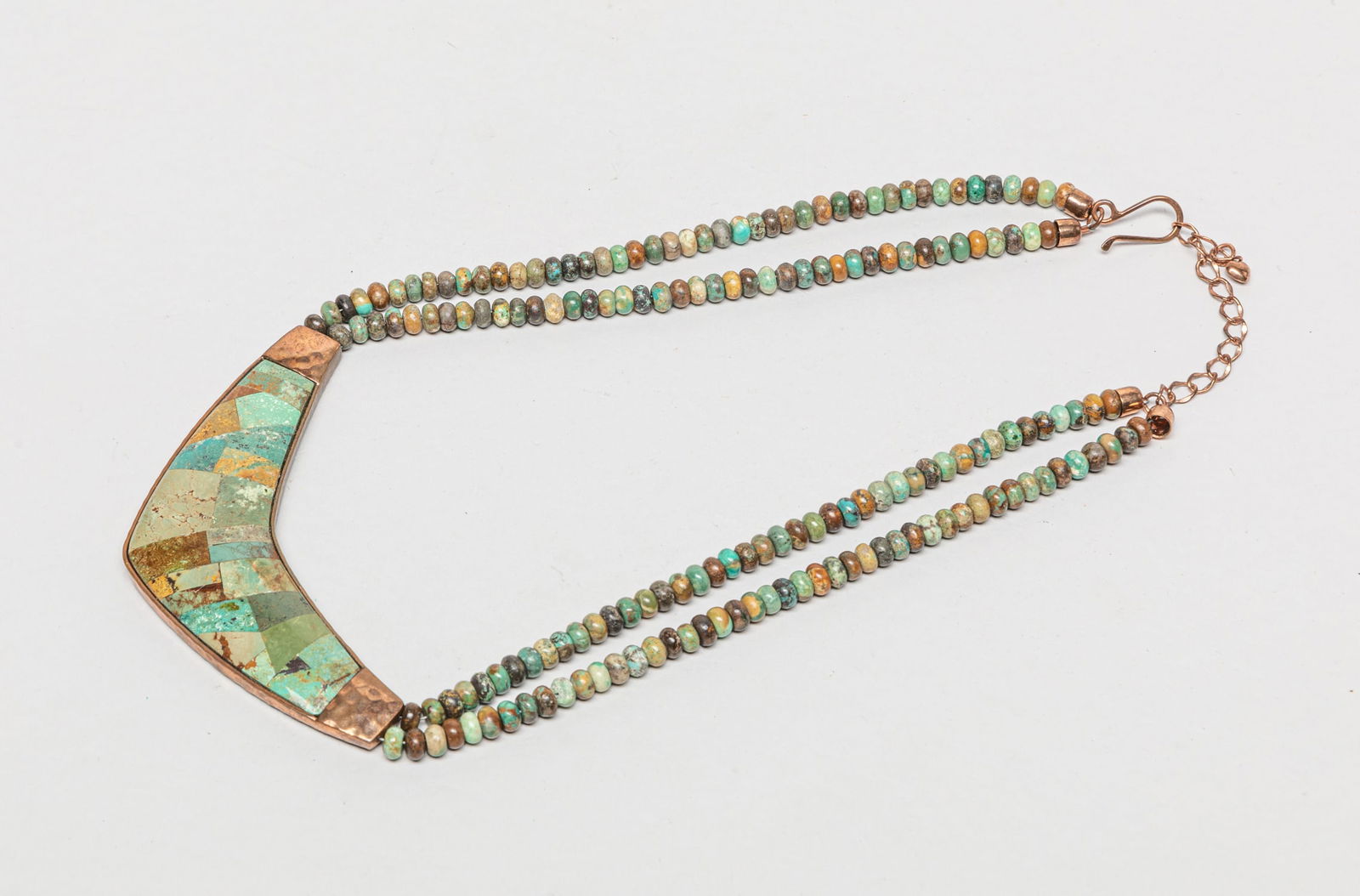 Vintage Nature Turquoise Necklace: Vintage nature turquoise bead necklace, with a large mosaic turquoise and metal pendant. Approx. 20inch L.