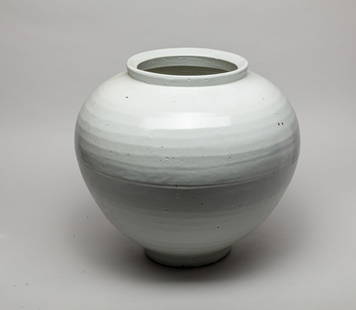 Massive Korean Porcelain Jar: Massive Korean white glazed porcelain jar. Approx. 15-14.2 inch.