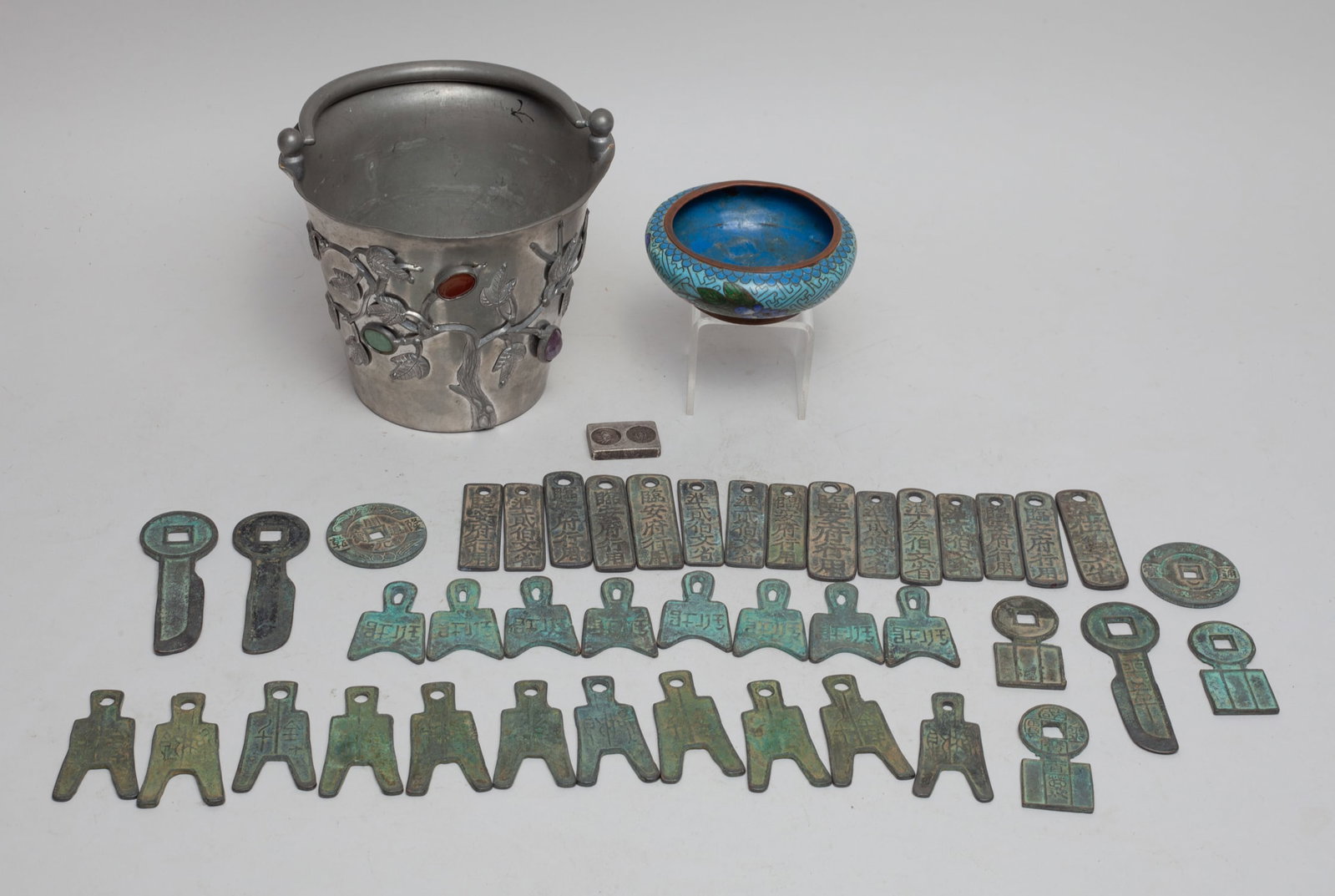 Chinese Pewter, Cloisonne & Bronze Coins: Including a cloisonne washer, a pewter vase cast with flower and leaf branches and inset with multi gemstone, and a large group of bronze Fengshui coins. Approx. 5.3-5.9 inch. (vase size).n