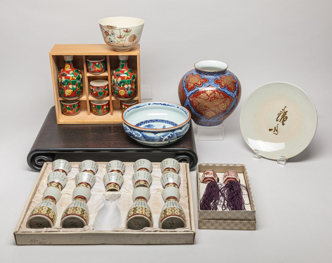 Vintage Japanese Porcelain Wine Set: Vintage Japanese porcelain saki set. Size varies.
