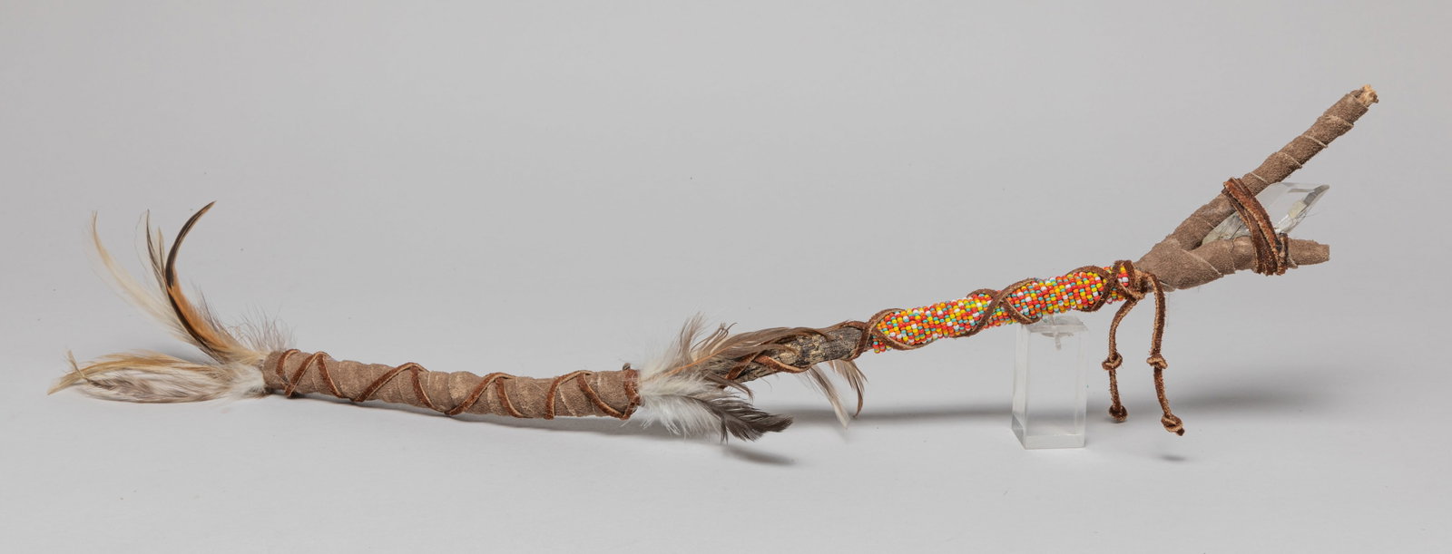 Zuni Medicine Man Spear w/ Crystal: Special Zuni fetish medicine man spear, decorated with crystal, beads and feather. Approx. 19.5inch L.