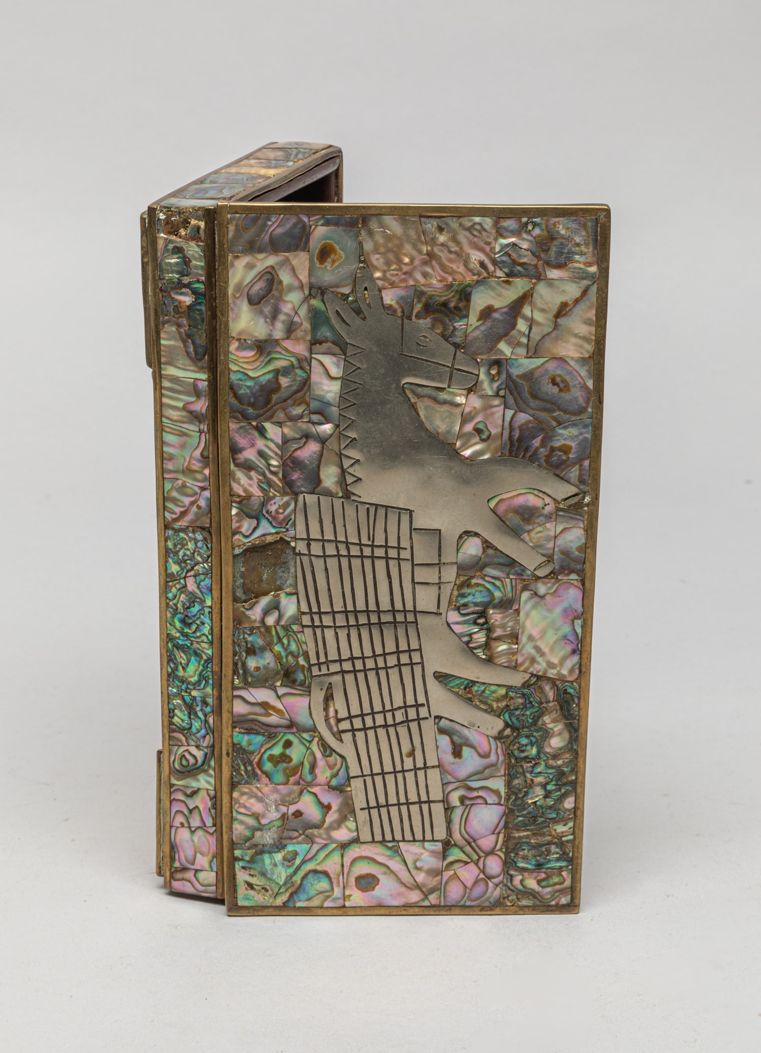 South American MOP Box: Collectible mother of pearl inlaid box, careved with a donkey. Approx. 7.7-3.8-0.9 inch.