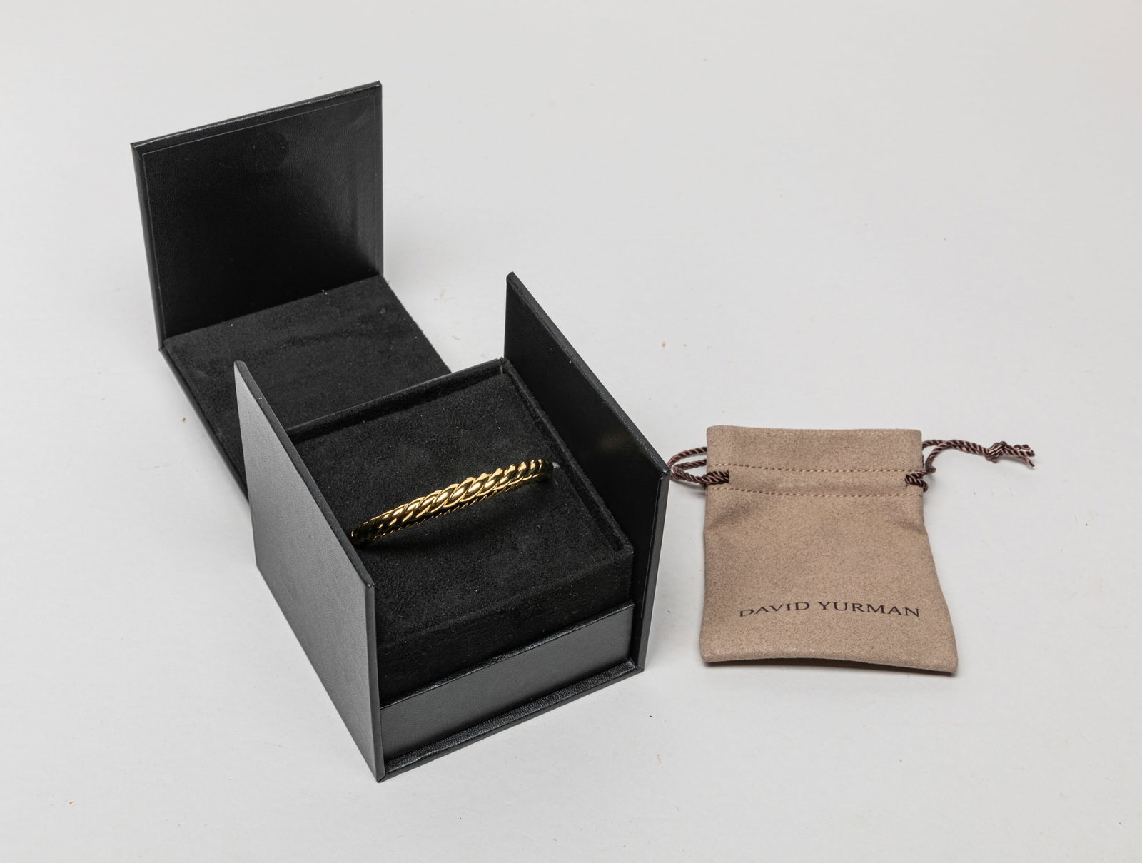 David Yurman Gold Filled on Silver Bangle: Designed David Yurman gold-filled on silver bangle, with dusty bag and box. Approx. 28 gram (total weight).