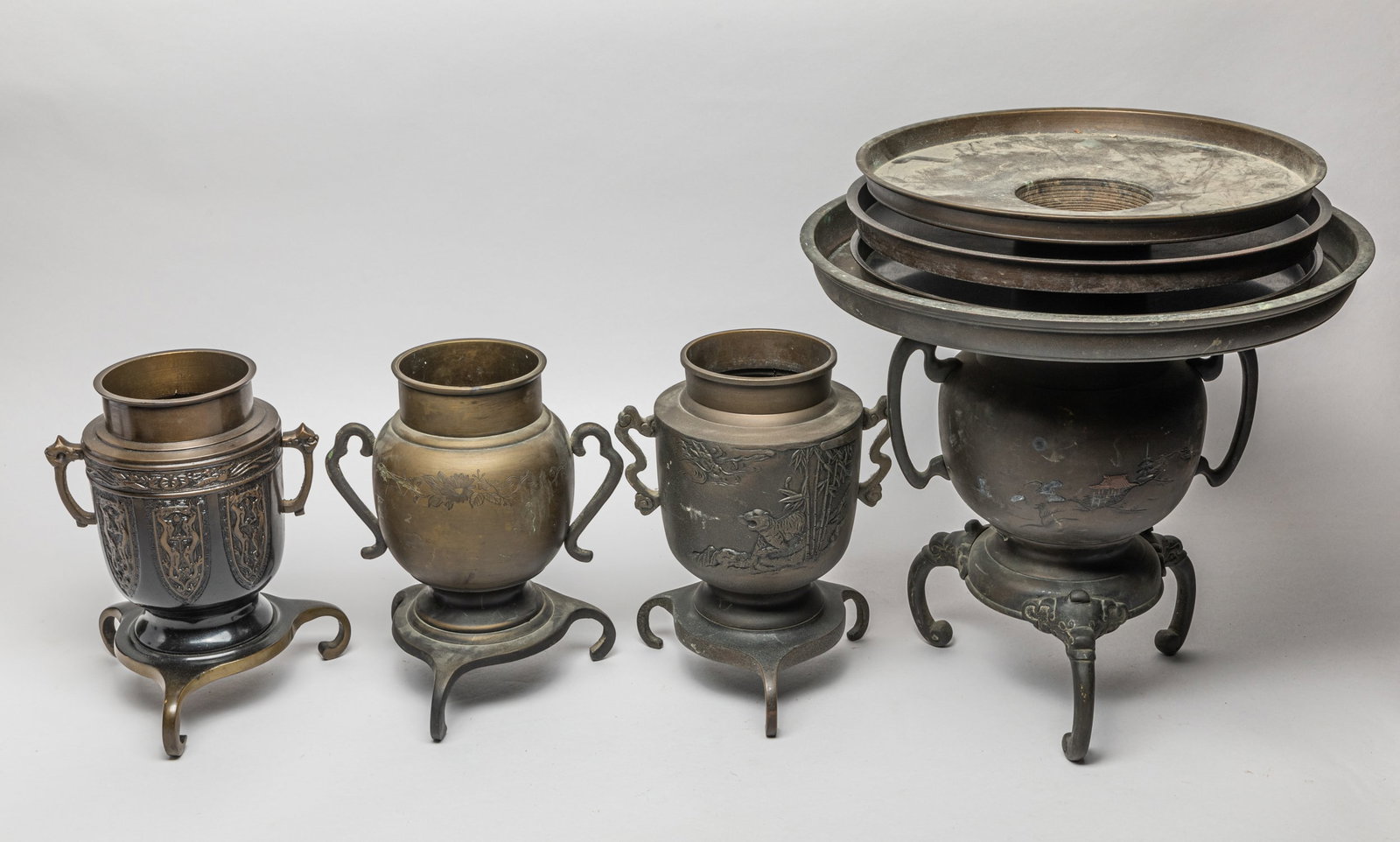 Set Japanese Bronze Vases: Group of 4 Japanese type bronze vases with lids. Size varies.