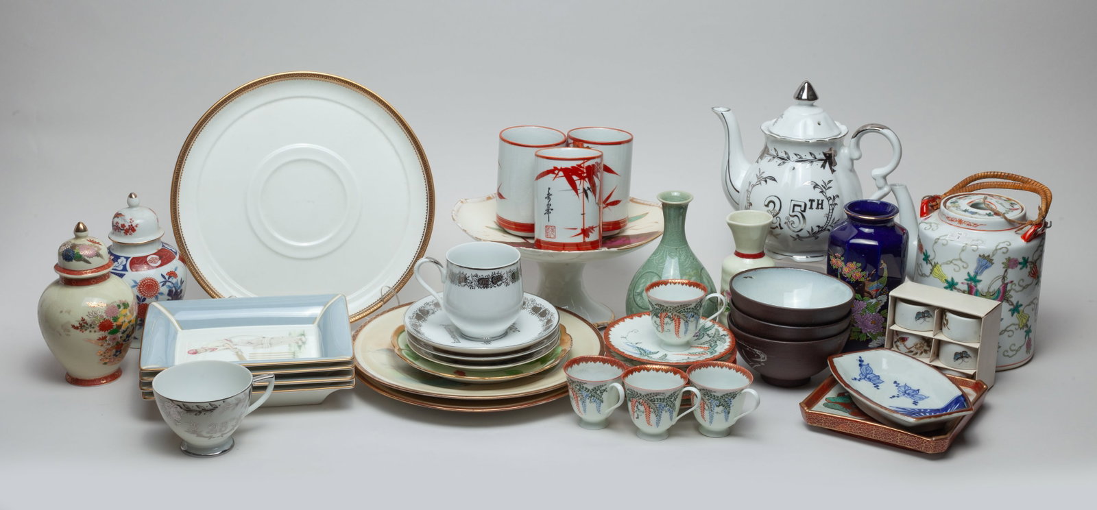 Large Set Asian Porcelains: Large group of Asian porcelain pieces, including bowls, plates, vases, pots and cups. Size varies.