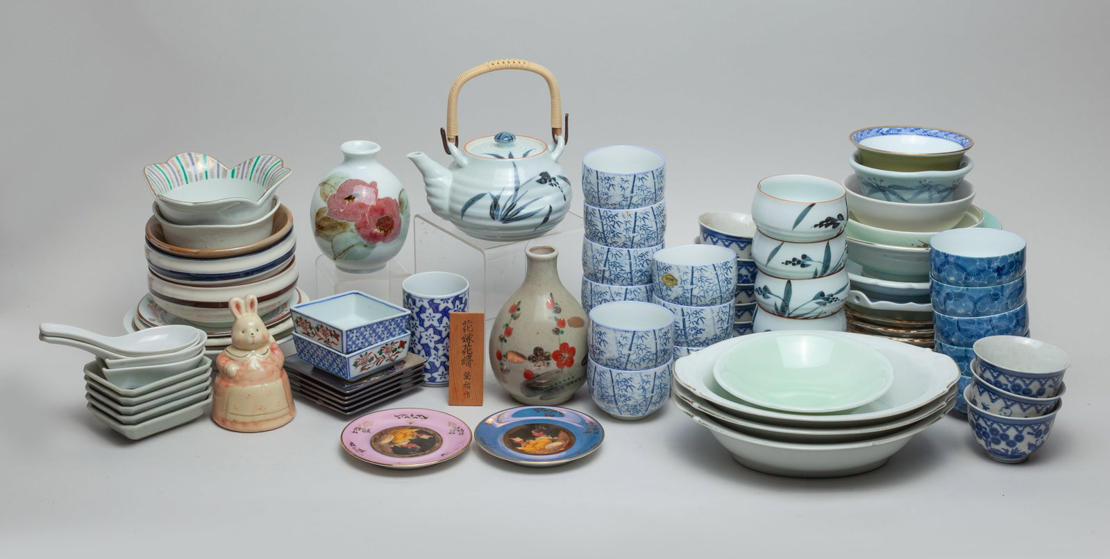 Estate Asian Porcelain Sets: Large group of Japanese porcelain cups, bowls, plates, vases and tea pots. Size varies.