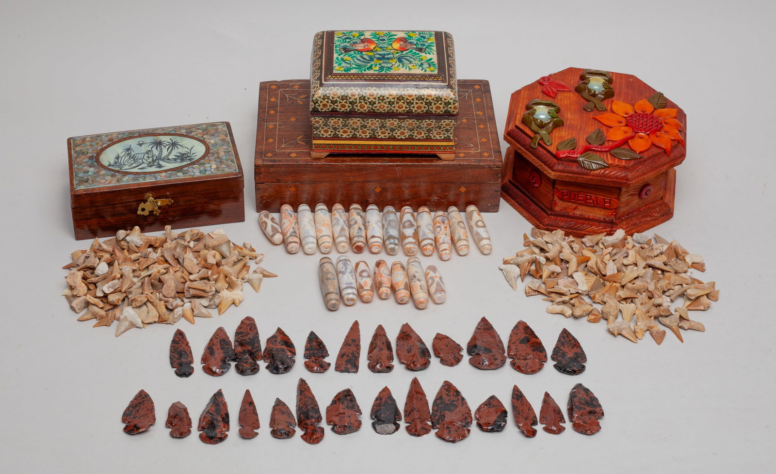 Tibetan Beads, Shark Teeth & Indian Points: Large group of American Indian type stone points, tooth sculptures, and Tibetan beads, with four boxes. Size varies.