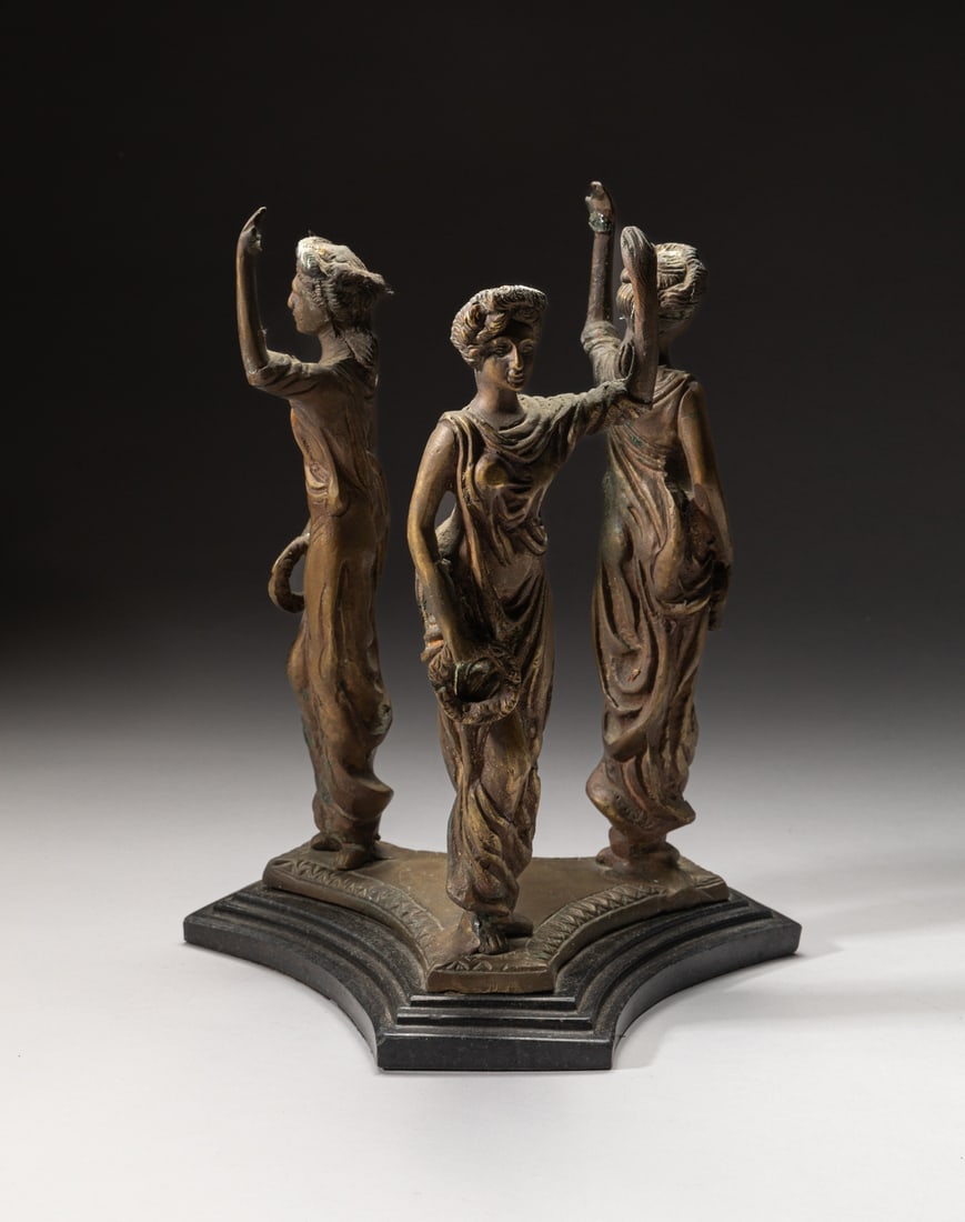 France Gilt Bronze/ Metal Stand: Special gilt metal/bronze stand molded as three females standing on an irregular base. Approx. 9.2-7.2 inch.