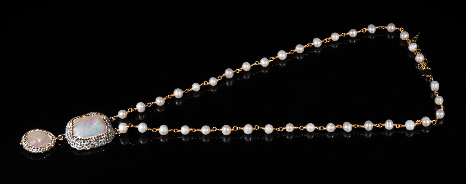 Gold Filled Sea Pearl Necklace: Designed gold-filled sea pearl necklace with mother of pearl pendants. Approx. 19inch L.