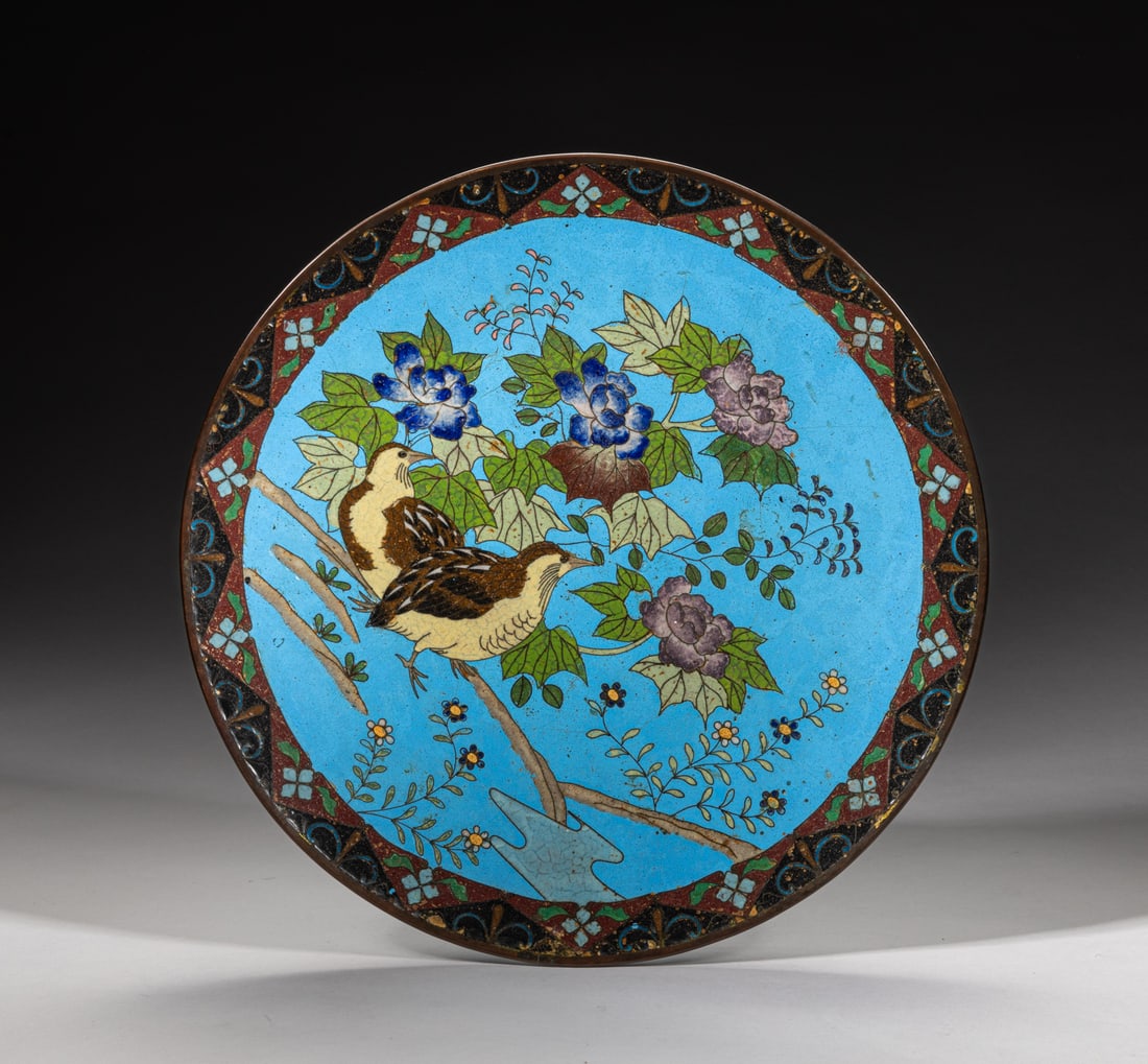 Japanese Meiji Cloisonne Charger: The charger interior enameled with birds and flowers on blue ground, the underside with scrolls. Approx. 11.8inch W.
